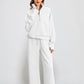 Set aus hochgeschlossenem Pullover mit Reißverschluss und Hose mit weitem Bein für Damen