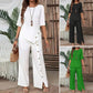 Zweiteiliges Damen-Set aus Top mit asymmetrischem Saum und Hose mit weitem Bein